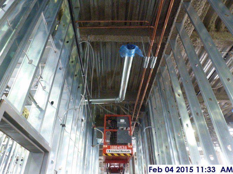 Installing ductwork fitters at the 3rd floor Facing West